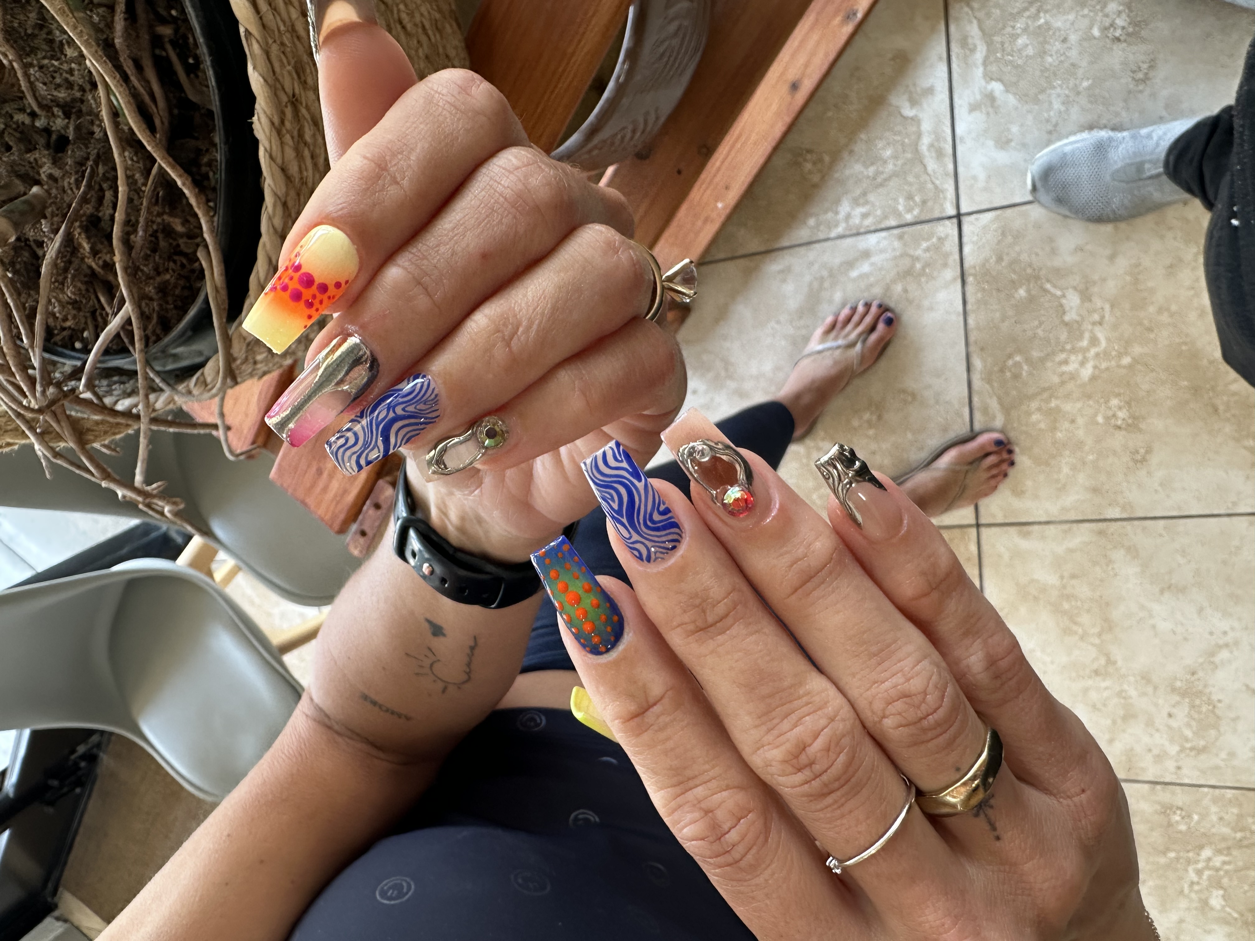 Blue orange chrome abstract bold coffin nail art with gems ColorLab Nail Studio Koreatown Los Angeles
